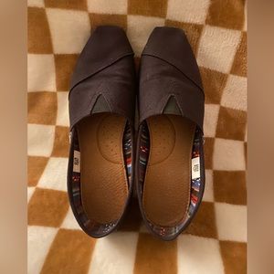 Toms woman’s black on black canvas size 8.5 slip on shoe